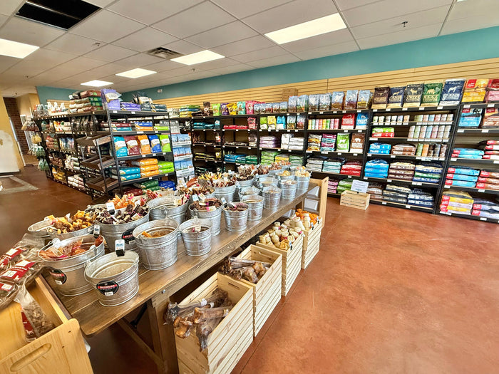 Picture of our chew table and food aisles in our Leawood store. 